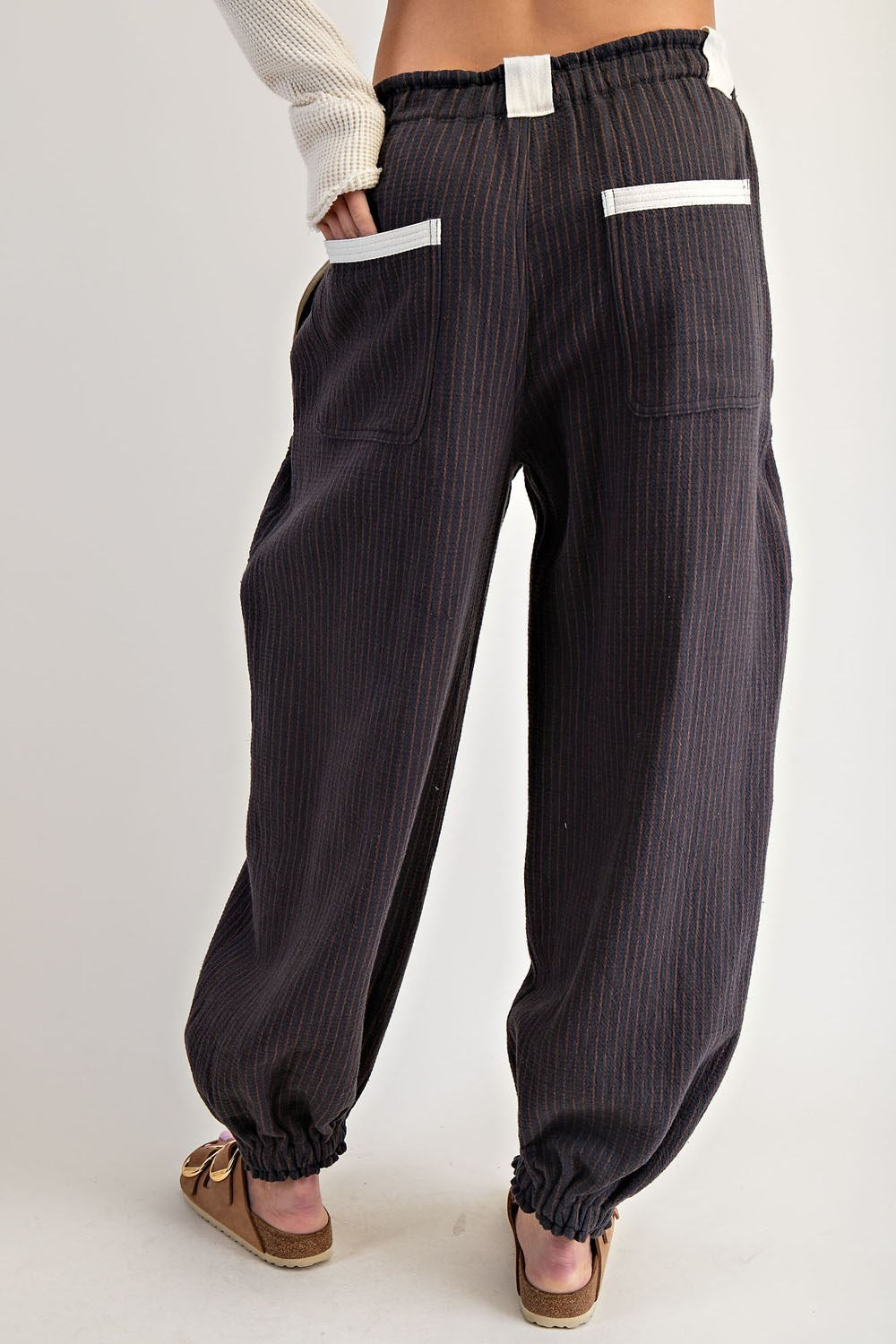 Passing Through Striped Pants